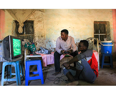 Playing a computer game at Yasirs home #3